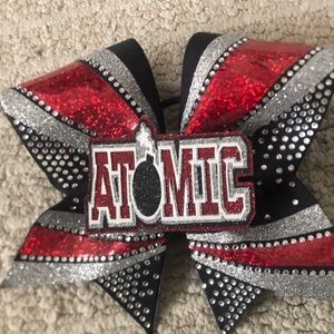 Customized red/white “atomic” cheer bow